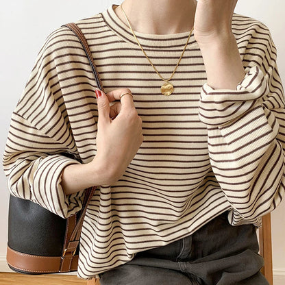 Comfortable women's stripe shirt with relaxed fit. Ideal casual wear top for versatile everyday fashion.