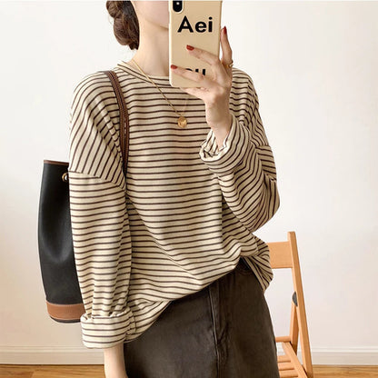 Women's heritage stripe long sleeve top, featuring a relaxed fit & crewneck for effortless style.