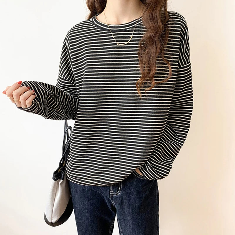 Women's relaxed fit stripe shirt. Crewneck long sleeve top, great for comfortable casual & layering fashion.