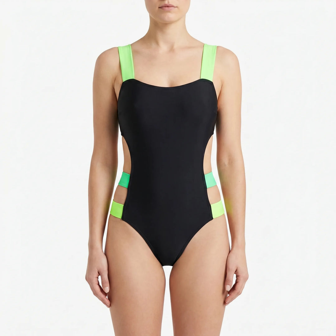 Sporty women's high-cut cutout monokini, a modern one-piece swimwear choice designed for active summer days.