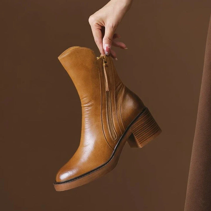 Elegant ladies' zippered ankle boots. High heel design with a shock-absorbing sole for ultimate comfort.