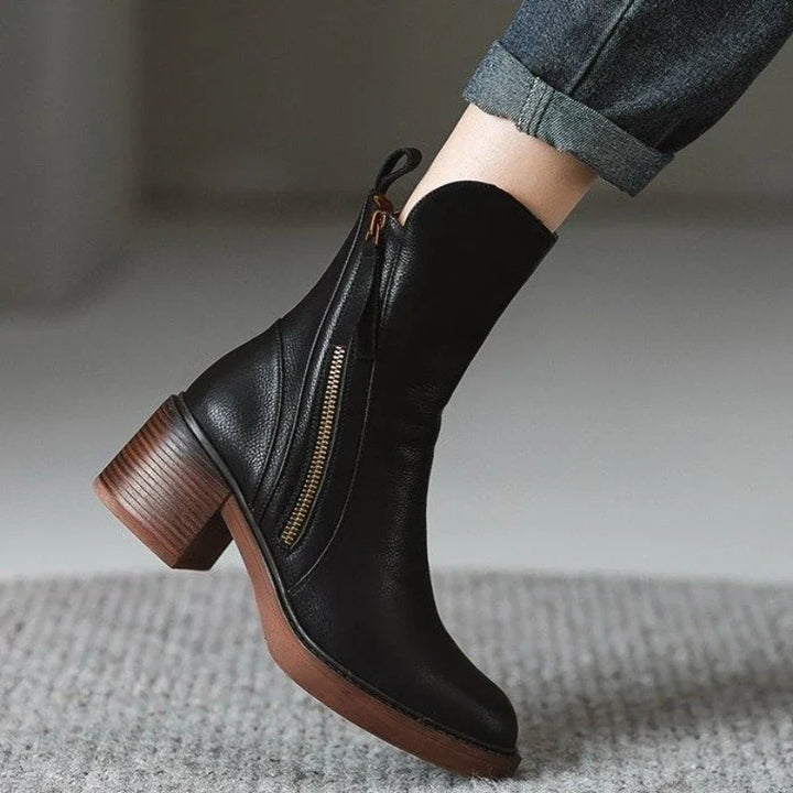 Ladies' high heel ankle boots with zipper. Shock-absorbing sole for ultimate comfort in dress footwear.