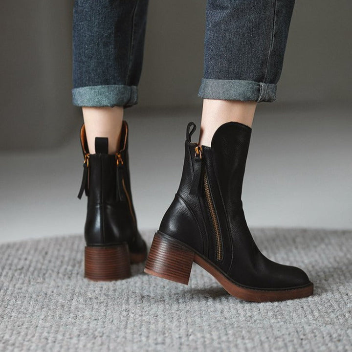 High heel ankle boots for women. Zippered, fashionable, & includes a shock-absorbing sole for support.
