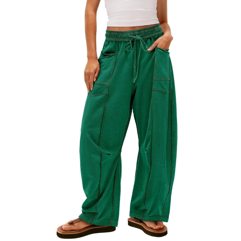 Modern barrel-leg high-rise sweatpants for women, offering a relaxed fit & chic comfort wear.