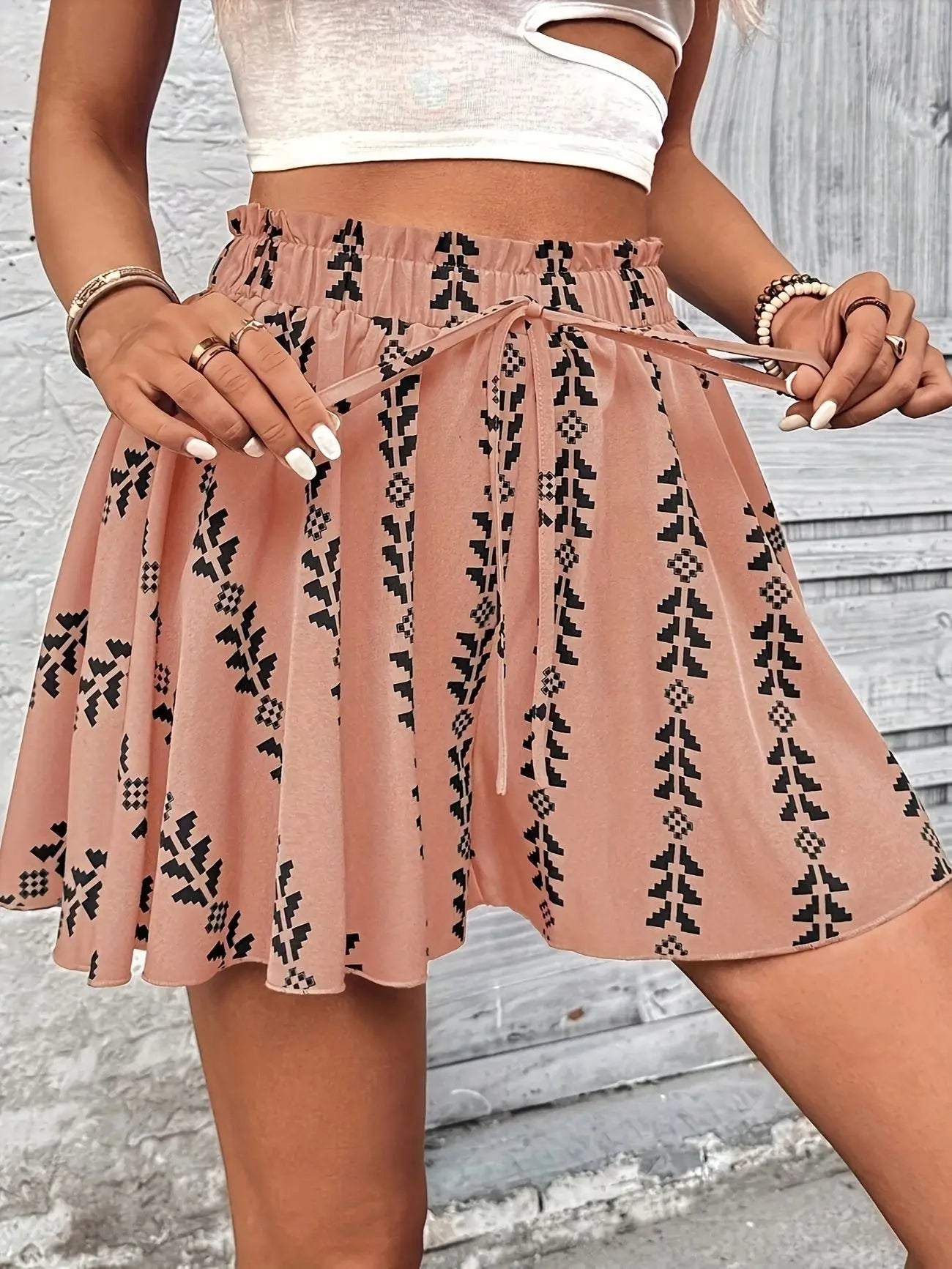 Women's high-rise, flowy flare shorts in a bohemian style with an intricate geometric pattern.