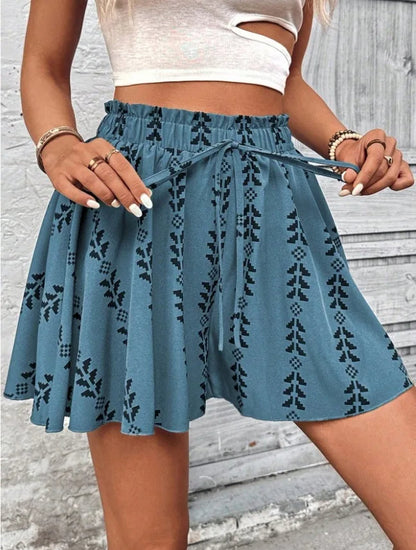 Bohemian high-waisted shorts for women, with a loose flare fit and modern geometric design.
