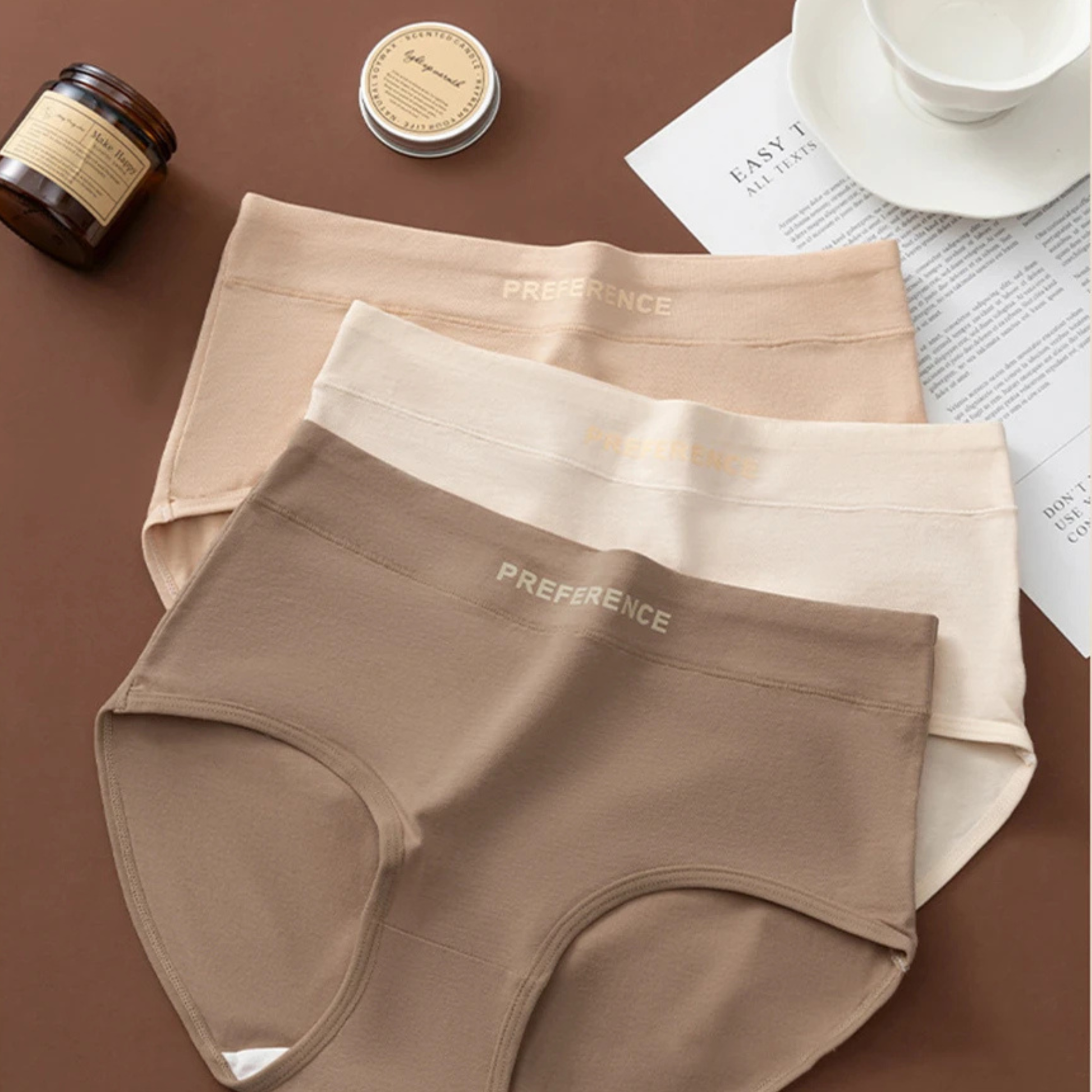 Multipack of women's high-rise cotton briefs, essential everyday breathable underwear.