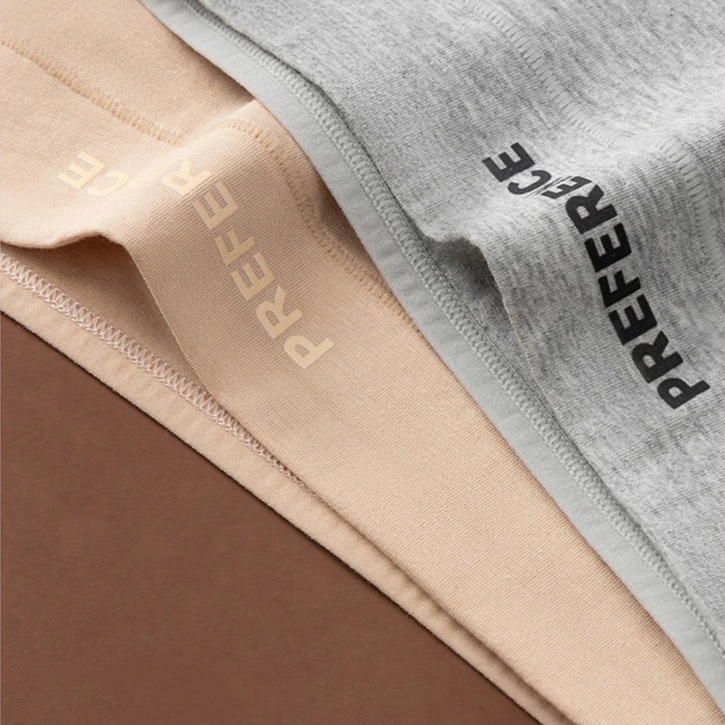 Close-up of soft fabric on women's breathable high-rise cotton briefs, premium quality.