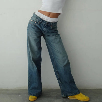 Effortlessly stylish women's high-rise flowing jeans. Comfortable relaxed fit bottoms for casual wear.