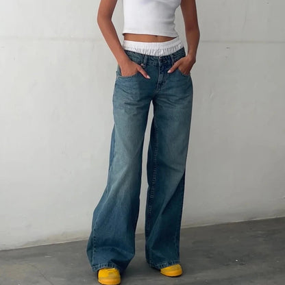 Modern women's high-rise flowing jeans. Relaxed fit denim pants, offering comfort & effortless style.