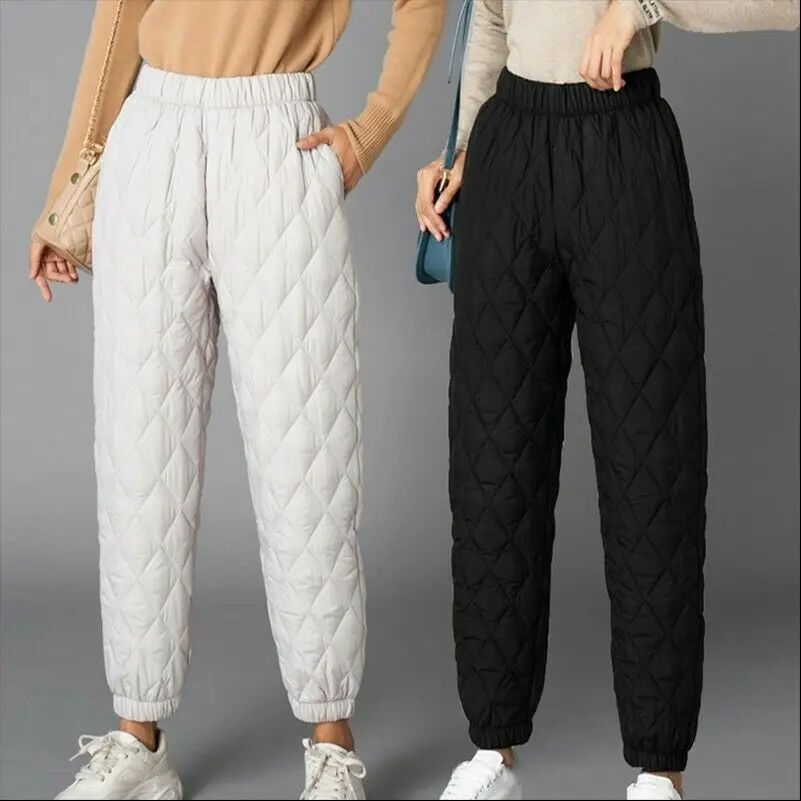 Women's high-rise puffer joggers, comfortable winter activewear for cozy days.