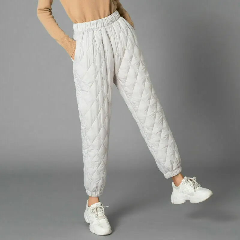 Casual women's high-rise puffer joggers for everyday wear, ideal for winter comfort.
