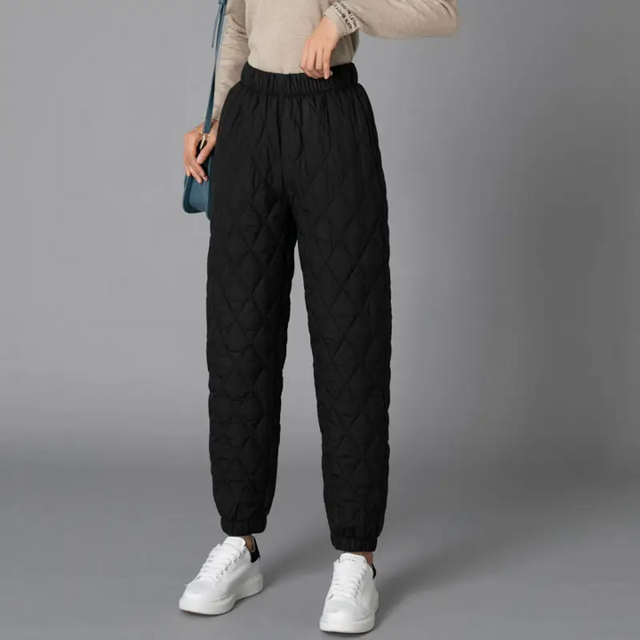 Cozy women's puffer joggers, high-rise and comfortable for relaxing or casual wear.