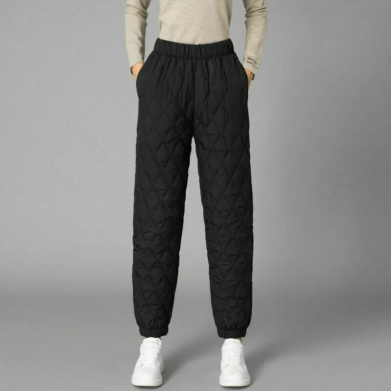 Stylish women's high-rise puffer joggers, perfect for winter activewear & casual looks.