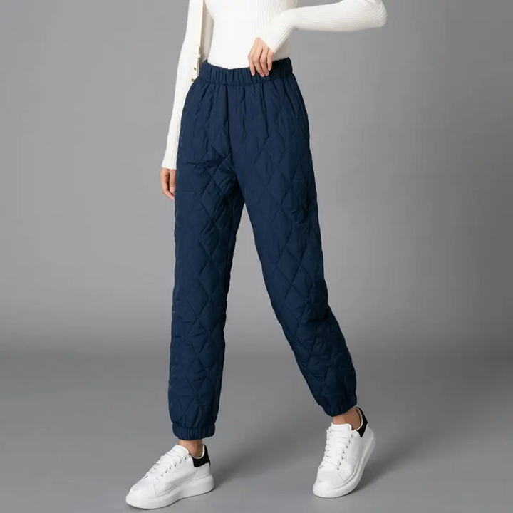 Warm women's high-rise puffer joggers, ideal winter pants for active or casual days.