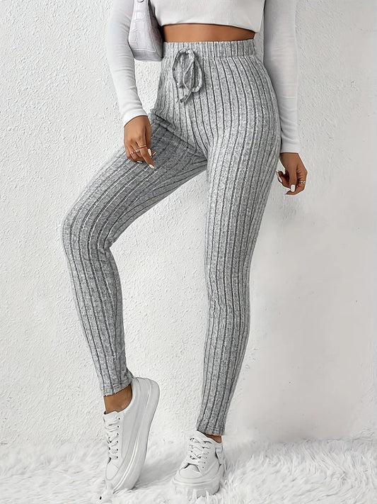Women's high-rise ribbed leggings, perfect for everyday comfort and casual wear. Stretchy & slim fit.