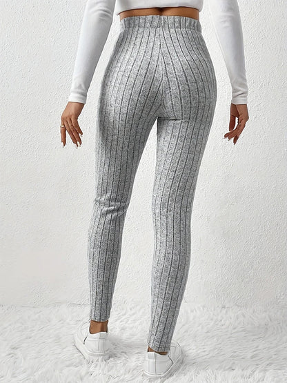 Stylish women's high-rise ribbed leggings, offering a slim fit & all-day comfort for versatile everyday fashion.