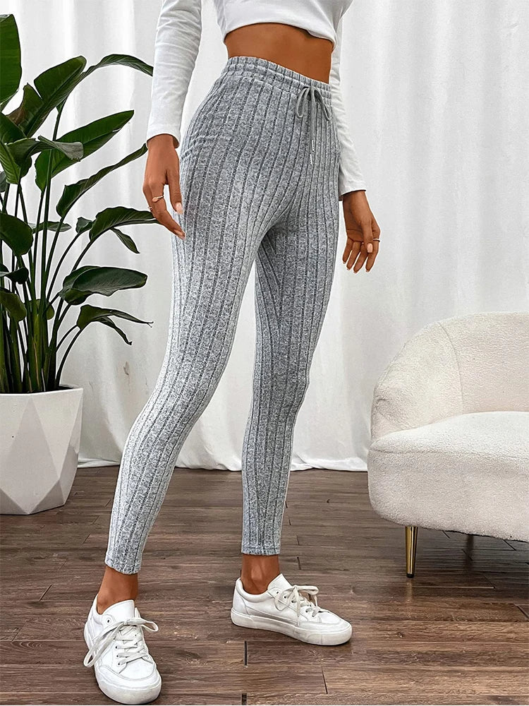 Women's stretch ribbed leggings in a flattering slim fit, perfect for casual outings or comfortable activewear.
