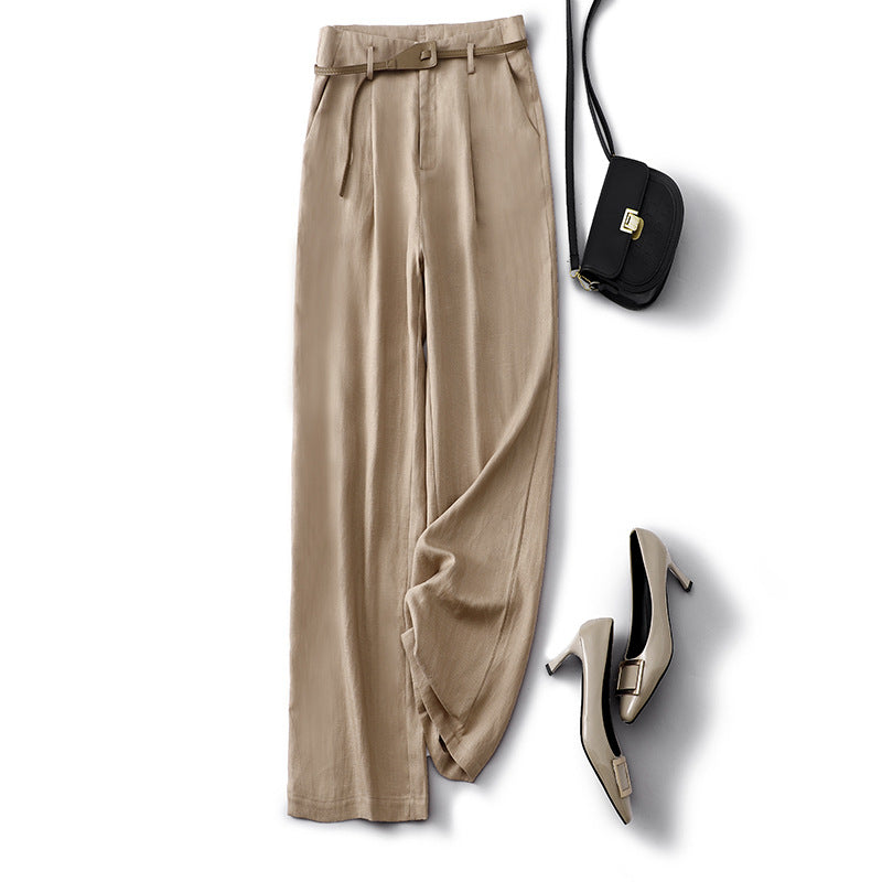 Cream high-rise women's trousers, versatile & chic. Effortless style for any occasion.