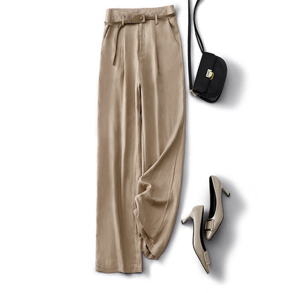Cream high-rise women's trousers, versatile & chic. Effortless style for any occasion.
