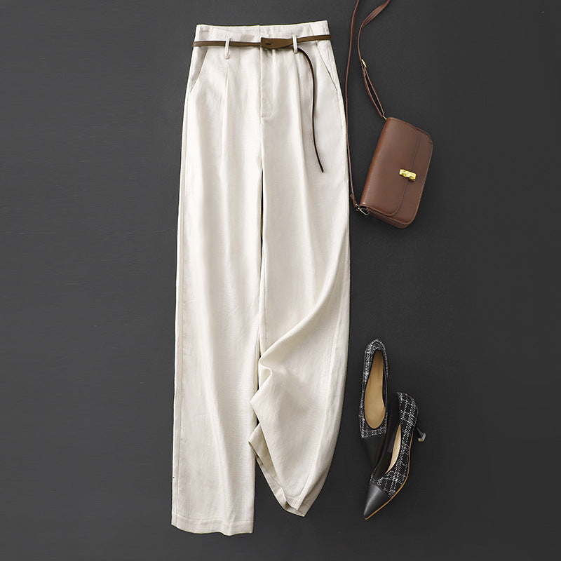 Brown high-rise women's trousers, elegant & versatile. Achieve a professional, stylish look effortlessly.