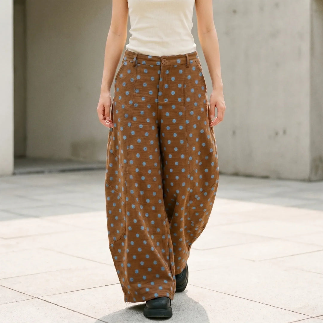 Women's high-rise wide barrel-leg pants with adjustable hem, perfect for comfortable streetwear & summer style.