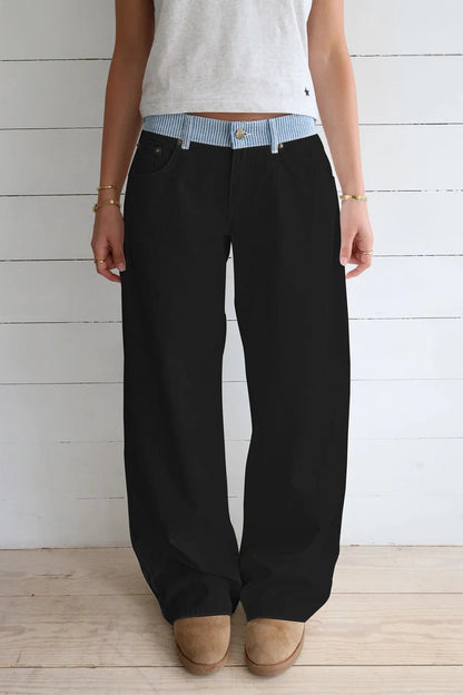 Stylish women's high-rise wide-leg denim jeans, perfect for pairing with your favorite tops.