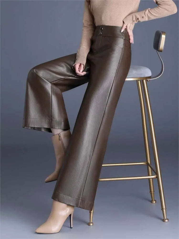 Women's high-rise wide-leg statement pants. Sleek, comfortable, and versatile for formal or casual wear.