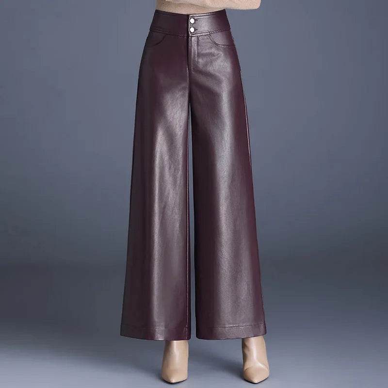 Stylish women's high-rise wide-leg pants, perfect for versatile fashion from office to casual outings.