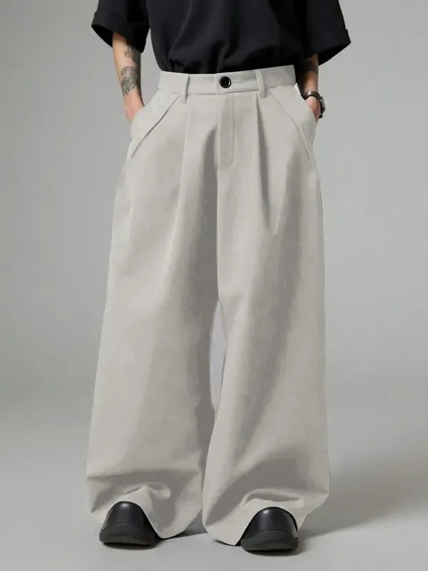Close-up of the luxurious wool blend fabric of women's wide-leg tailored trousers, highlighting quality.