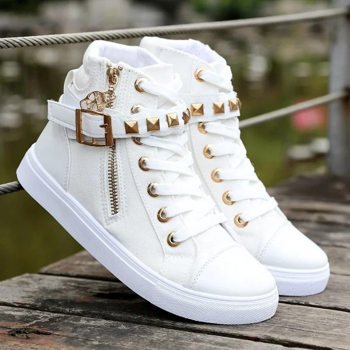 Women's high-top white sneakers with side zipper, blending stylish fashion with everyday comfort.