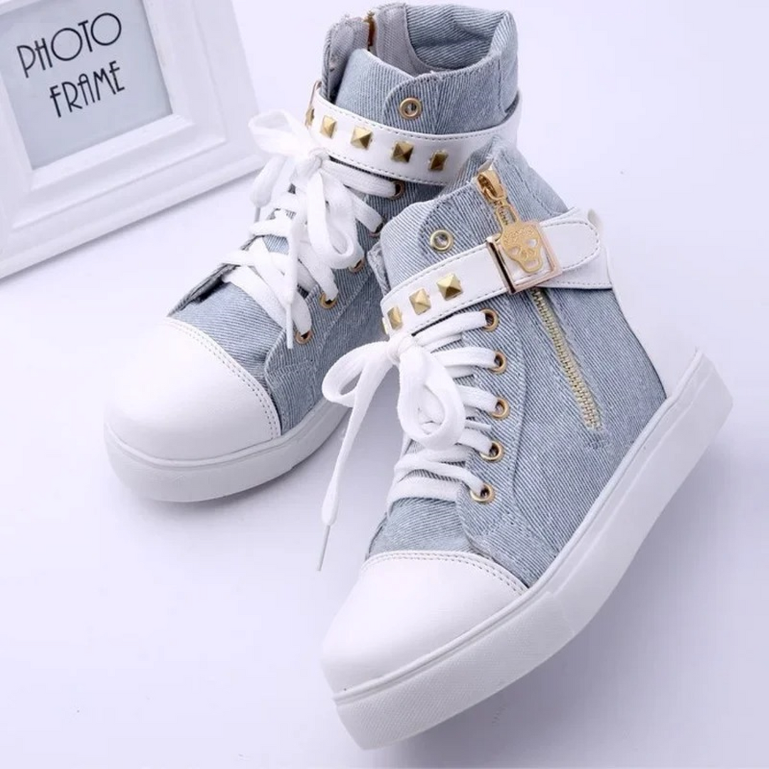 Fashionable women's white high-top sneakers featuring a sleek zipper detail for easy stylish casual wear.