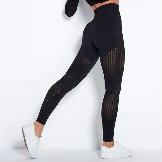 Women's high-waist anti-cellulite compression leggings, designed for smoother legs during yoga or workouts.