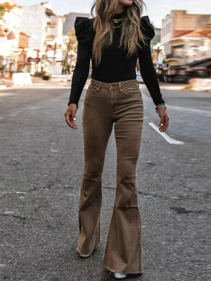 Modern women's high waist flare trousers, fashionable bottoms with comfort and pockets.