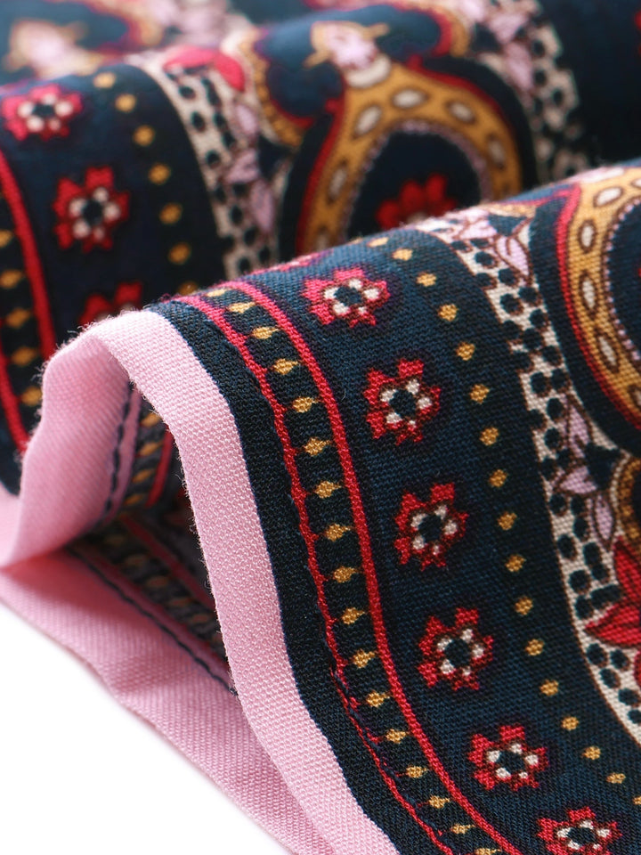 Elegant long skirt for summer: high waist, vibrant print, flowing, and a stylish side slit.