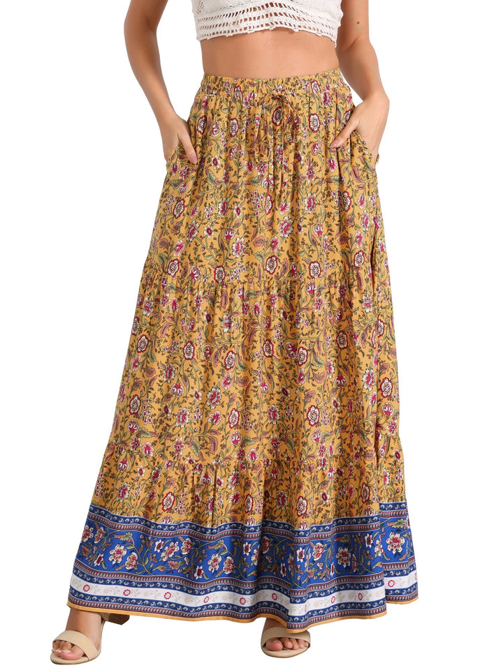 Beach style: flowing printed maxi skirt, high waist, lightweight, perfect with a side slit.
