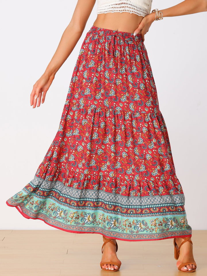Vivid print high waist maxi skirt, flowing silhouette, comfortable and featuring a side slit.