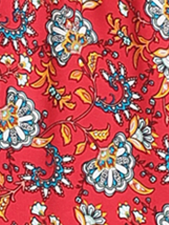 Dynamic printed maxi skirt, high waist, flowing fabric, perfect for a vibrant summer look.