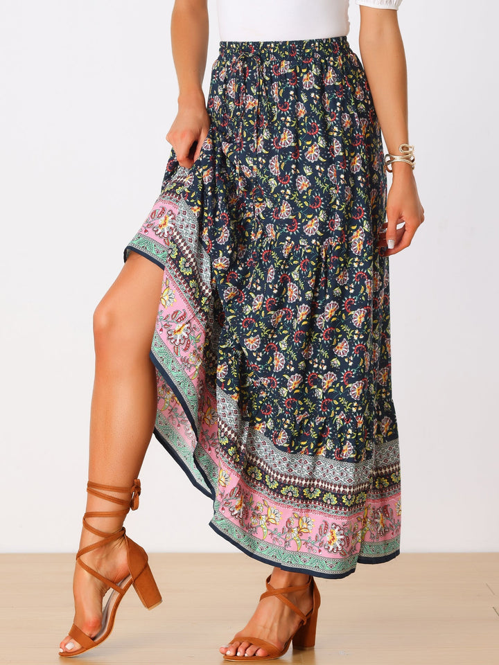Women's flowing printed maxi skirt for summer, high waist comfort, and elegant side slit.