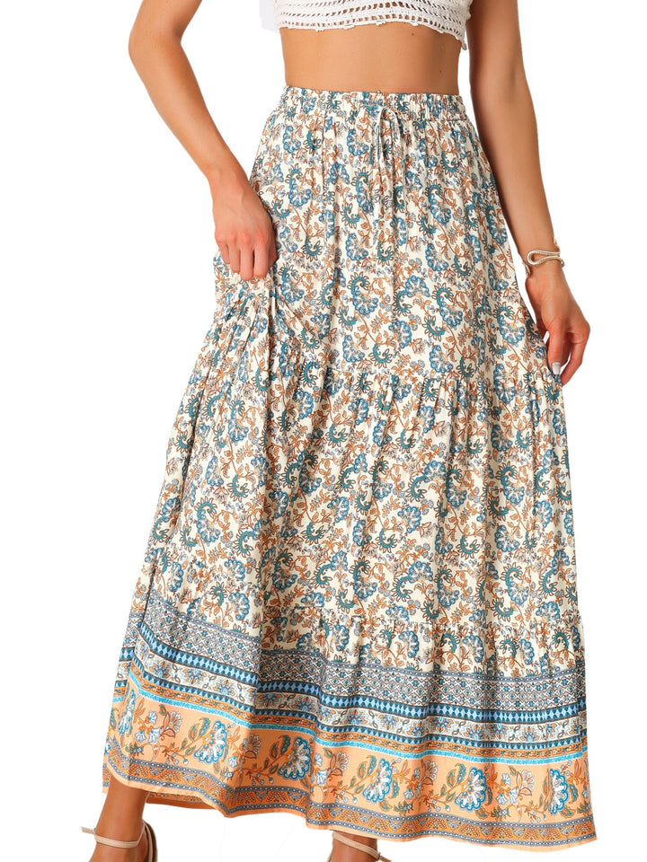 Maxi skirt: high waist, bold print, elegant flowing fabric, and a stylish side slit.