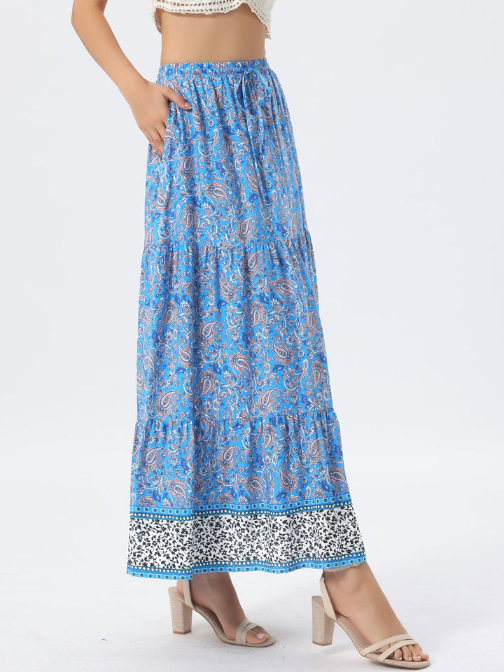 Stylish high waist printed maxi skirt, flowing and comfortable, with an appealing side slit.