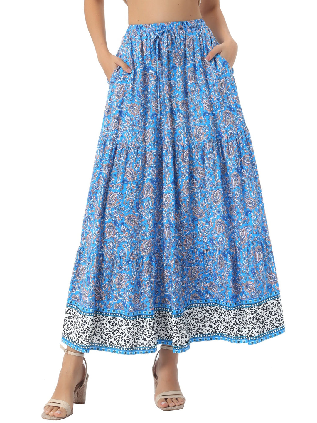Effortlessly chic high waist printed maxi skirt, flowing silhouette, and a daring side slit.