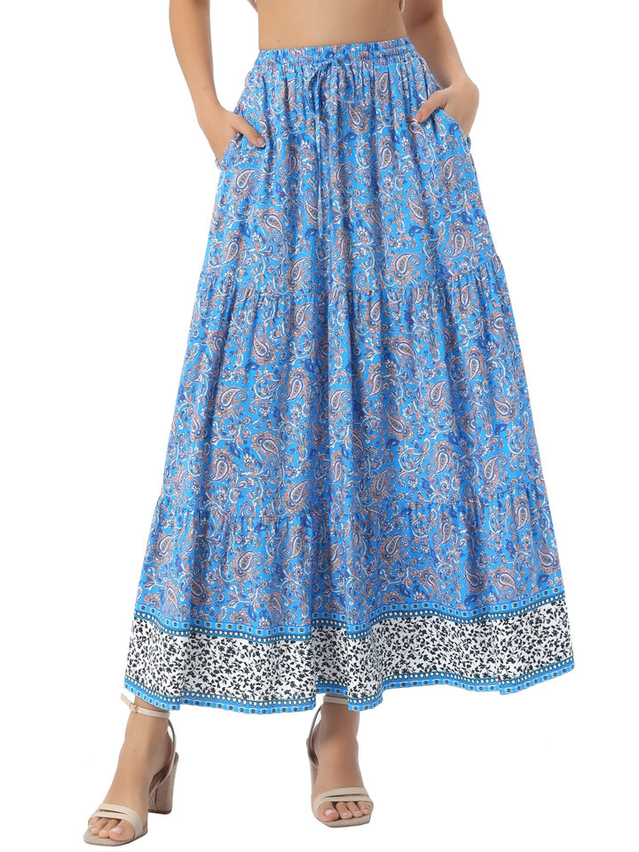 Effortlessly chic high waist printed maxi skirt, flowing silhouette, and a daring side slit.