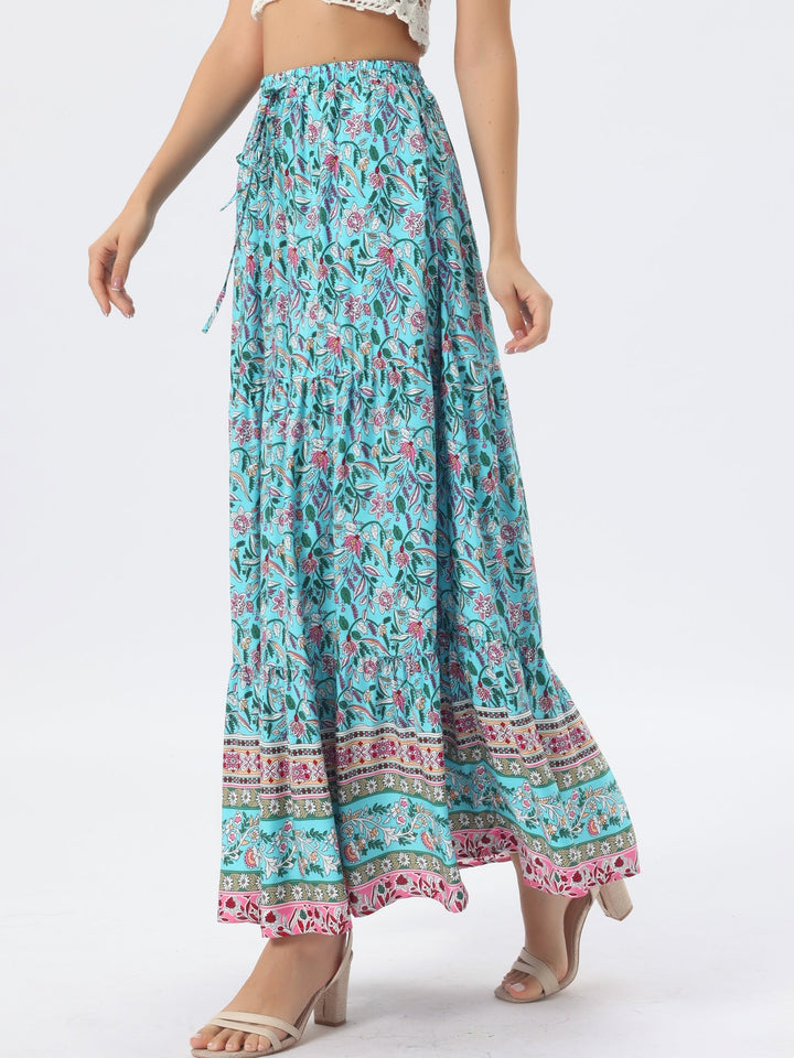 Women's elegant high waist printed maxi skirt, flowing with an attractive and airy side slit.