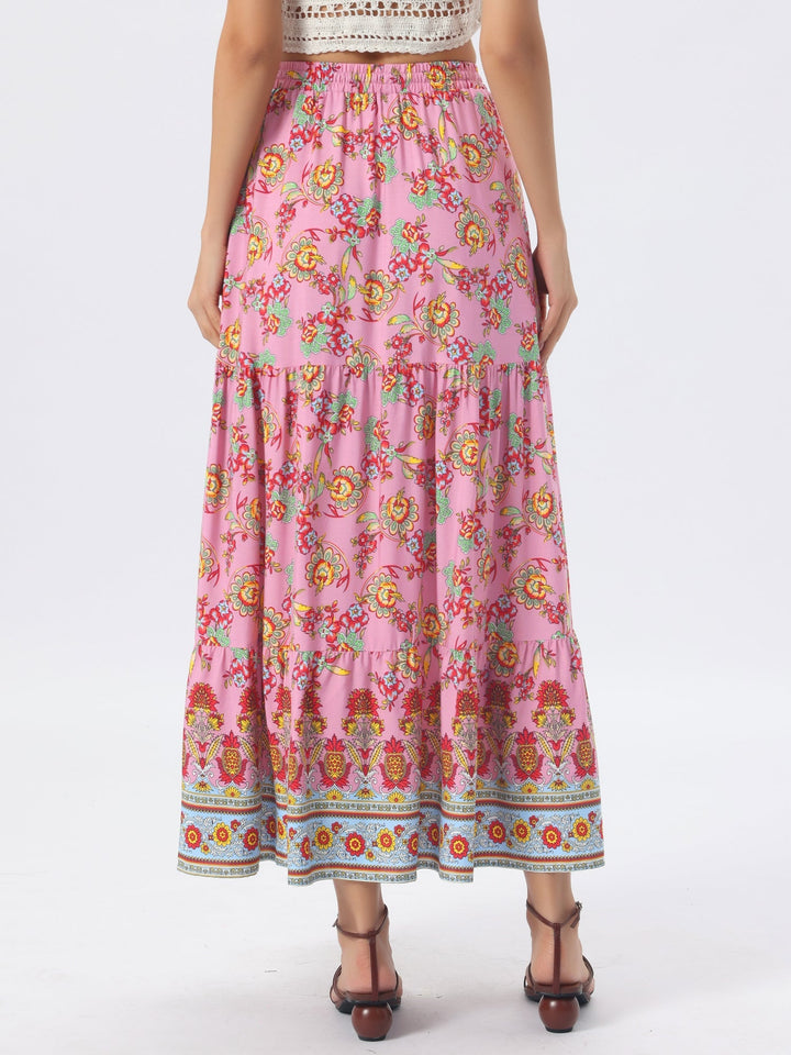 Trendy high waist printed maxi skirt, flowing for an elegant look, featuring a side slit.