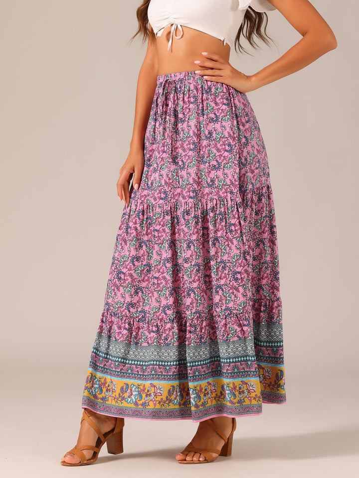 Bohemian printed maxi skirt, high waist design, flowing fabric, and a fashionable side slit.