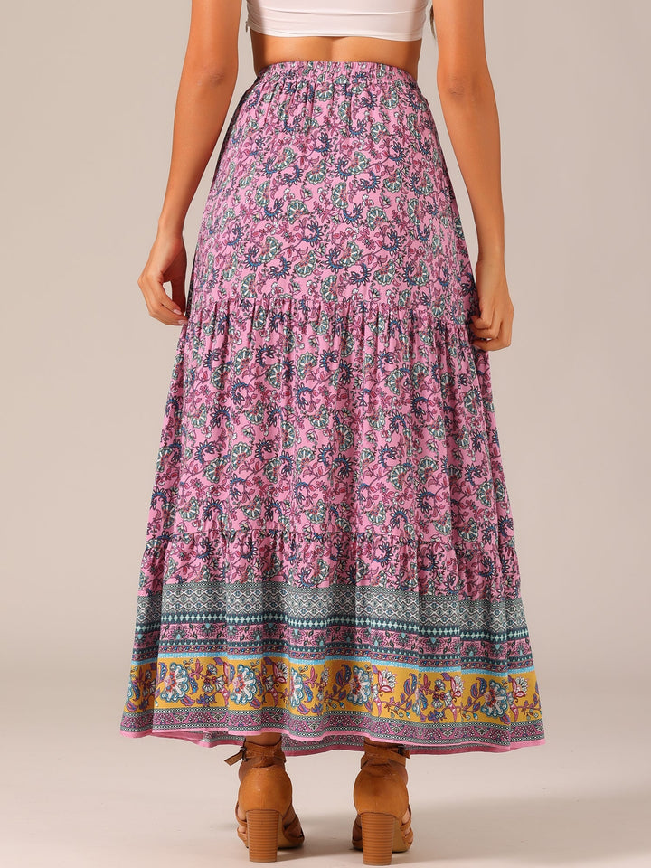 Elegant women's high waist printed maxi skirt, flowing with a sophisticated side slit.