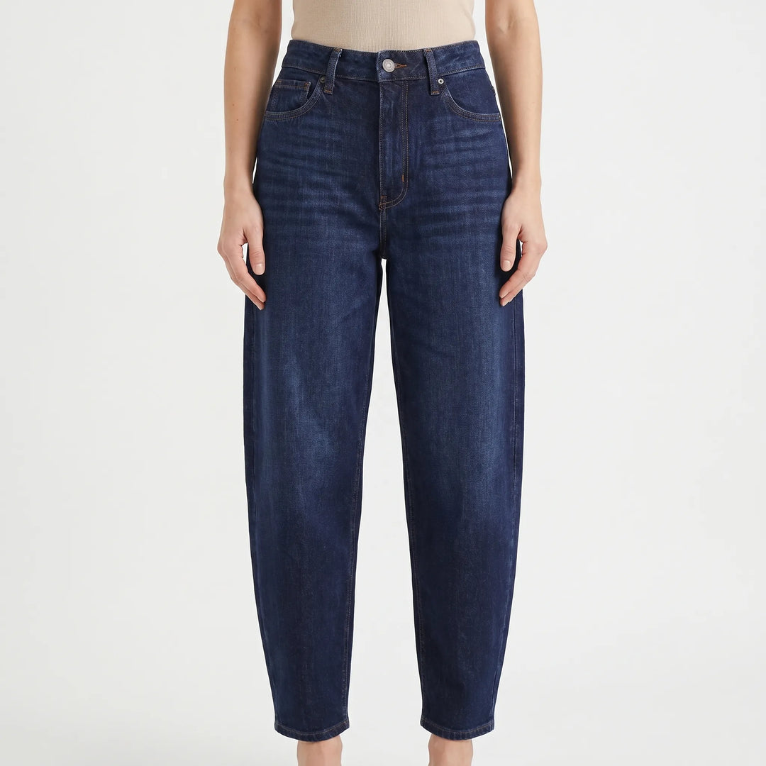 Stylish women's loose fit barrel-leg pants, high-waist and ankle-length for a casual fashion look.
