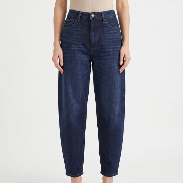 Stylish women's loose fit barrel-leg pants, high-waist and ankle-length for a casual fashion look.