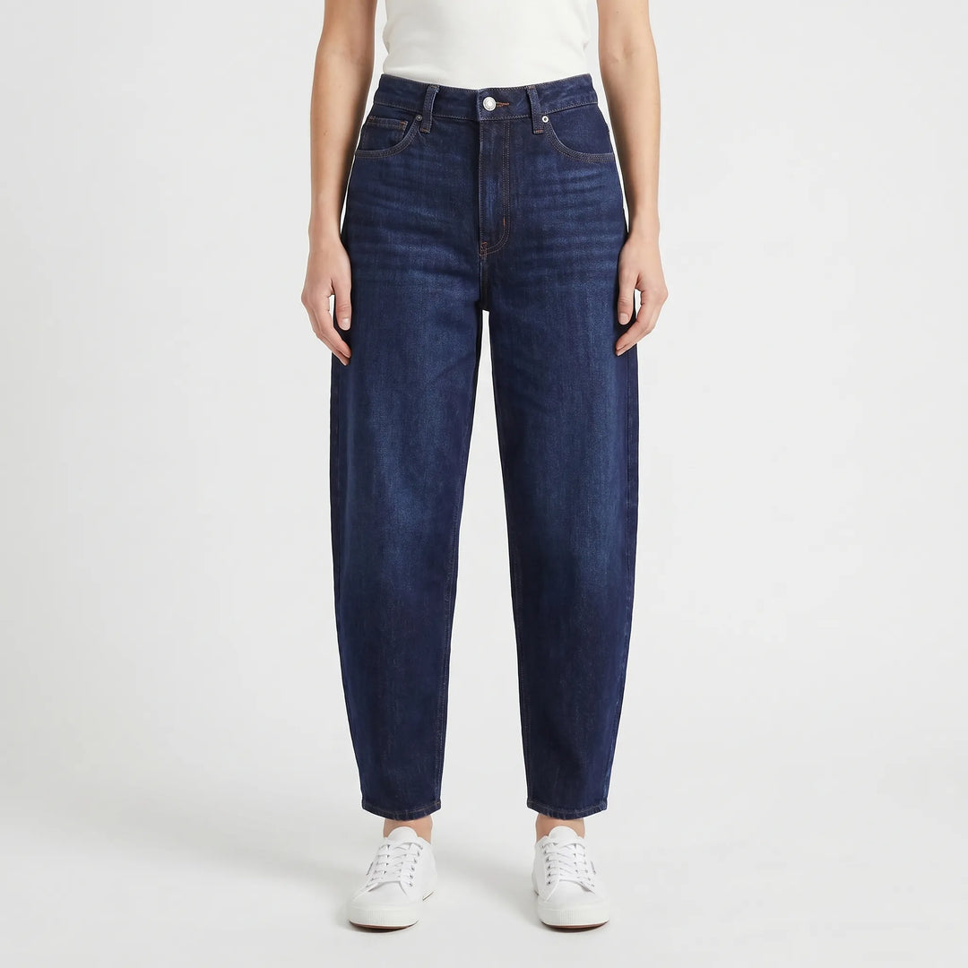 Fashionable women's barrel-leg pants with a high-waist and relaxed silhouette, offering modern style.